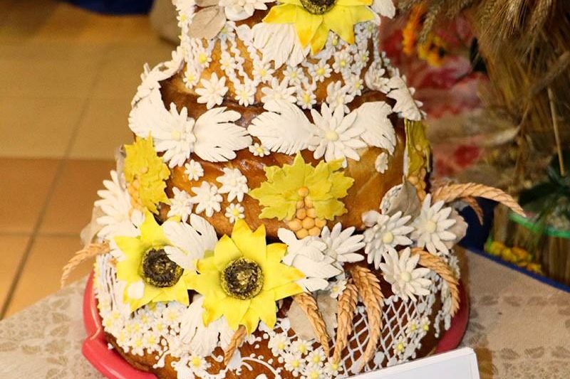 Фоторепортаж: Выставка снопов и караваев на районном празднике "Дожинки" в Поставах